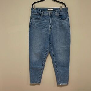 Levi’s High Rise Mom Jeans in color Medium Indigo.